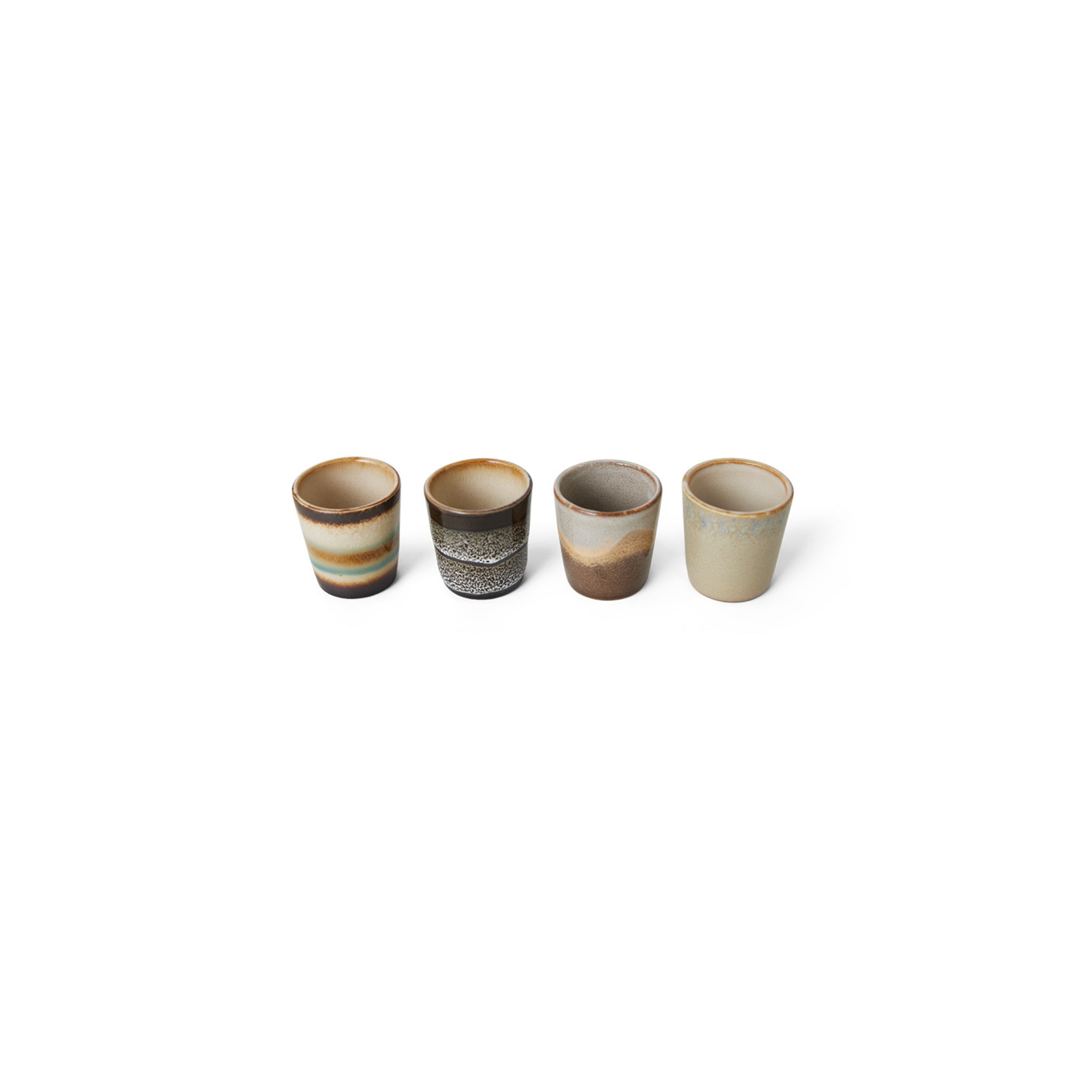De HK Living 70s Ceramics Eierdop Granite set bestaat uit 4 stijlvolle eierdopjes met retro granieten afwerking-perfect om een vintage touch toe te voegen aan je ontbijttafel.