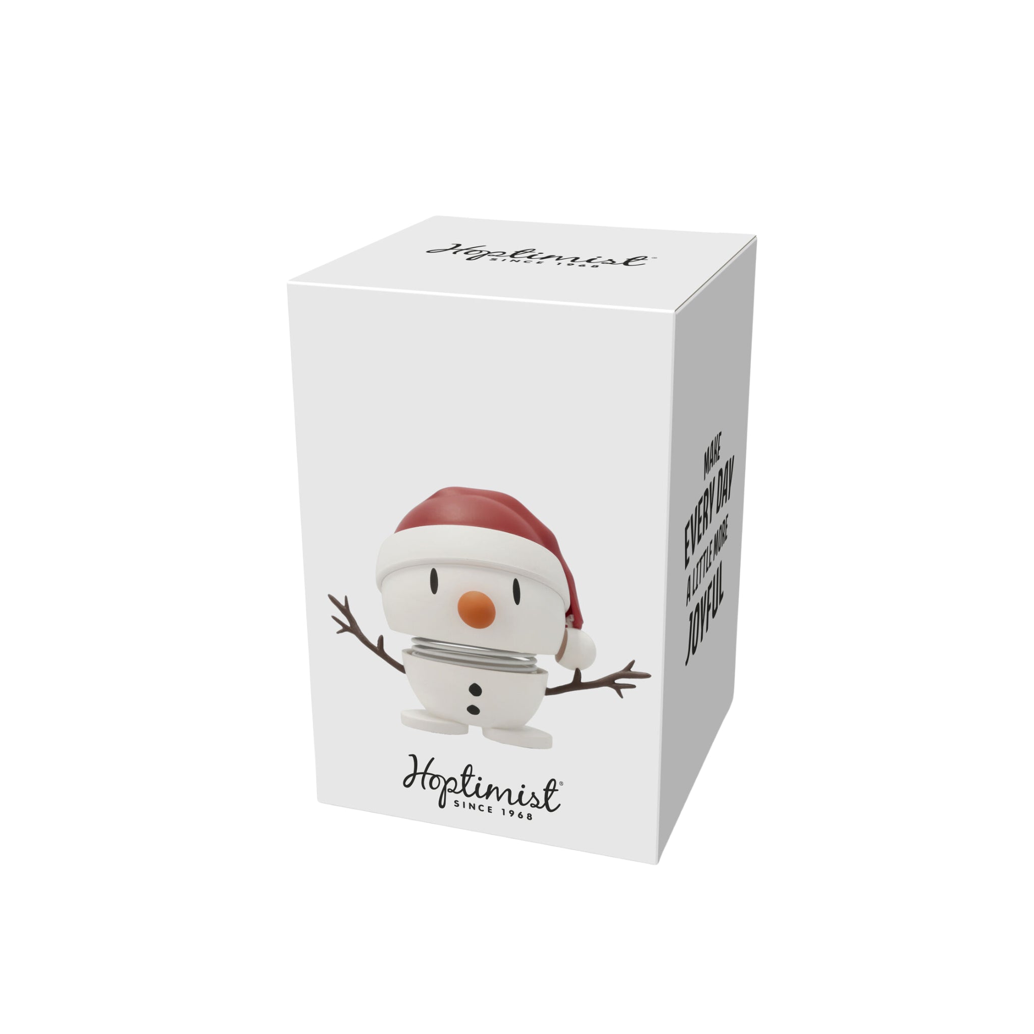 Een wit doosje met een cartoonsneeuwpop met een rode kerstmuts, gelabeld Hoptimist Soft Santa Sneeuwman S Wit by Hoptimist. De zinnen "Hoptimist Since 1968" en "Make every day full of joy!" voegen charme toe als kerstdecoratie.