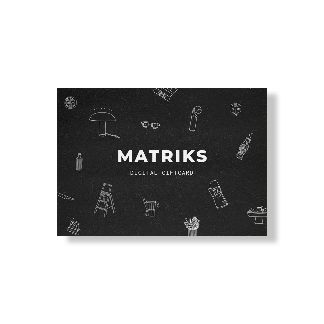 De Matriks Cadeaubon is een zwarte digitale cadeaukaart van Matriks, met "MATRKS" en "DIGITAL GIFTCARD" in witte tekst en minimalistische line art van interieuraccessoires zoals een stoel, zonnebril, paddenstoel en plant.