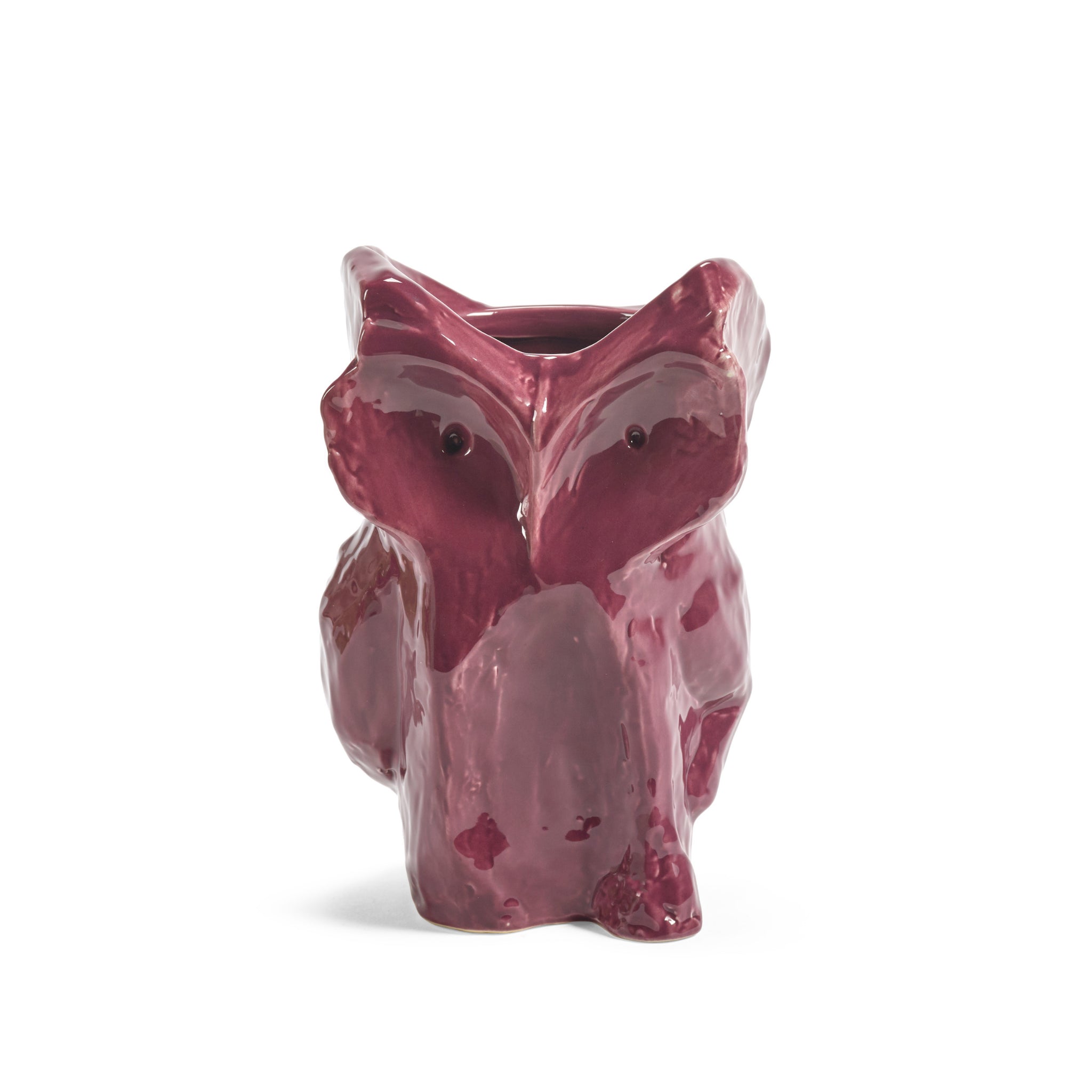 De Serax After Midnight Uil Vaas Aubergine S is een glanzende, diepe vaas van aubergine keramiek in de vorm van een gestileerde vos, met overdreven details en een gladde afwerking met een opening aan de bovenkant en een licht ongelijke basis die het speelse ontwerp van Serax weerspiegelt.