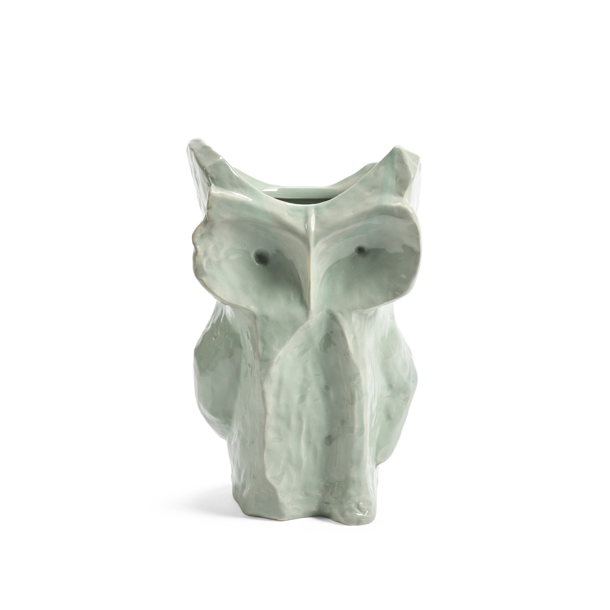 De Serax After Midnight Uil Vaas Lichtblauw S is een vaas van lichtblauw keramiek van Serax, in de vorm van een abstracte uil met een glanzende afwerking en subtiele gezichtsdetails, afgebeeld tegen een witte achtergrond.