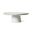 De HK Living 70s Ceramics Plateau/Taartschaal Smudge M heeft een glanzende, gemarmerde lichtgroene en witte afwerking met een brede, platte bovenkant en stevige basis - een retro jaren 70 stijl tegen een effen witte achtergrond.