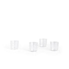 Vier Hay Angle Waterglazen 4 st. van Hay, gemaakt van kristallijn glas, zijn gegroepeerd op een witte achtergrond met royale lege ruimte erboven voor een elegante uitstraling.