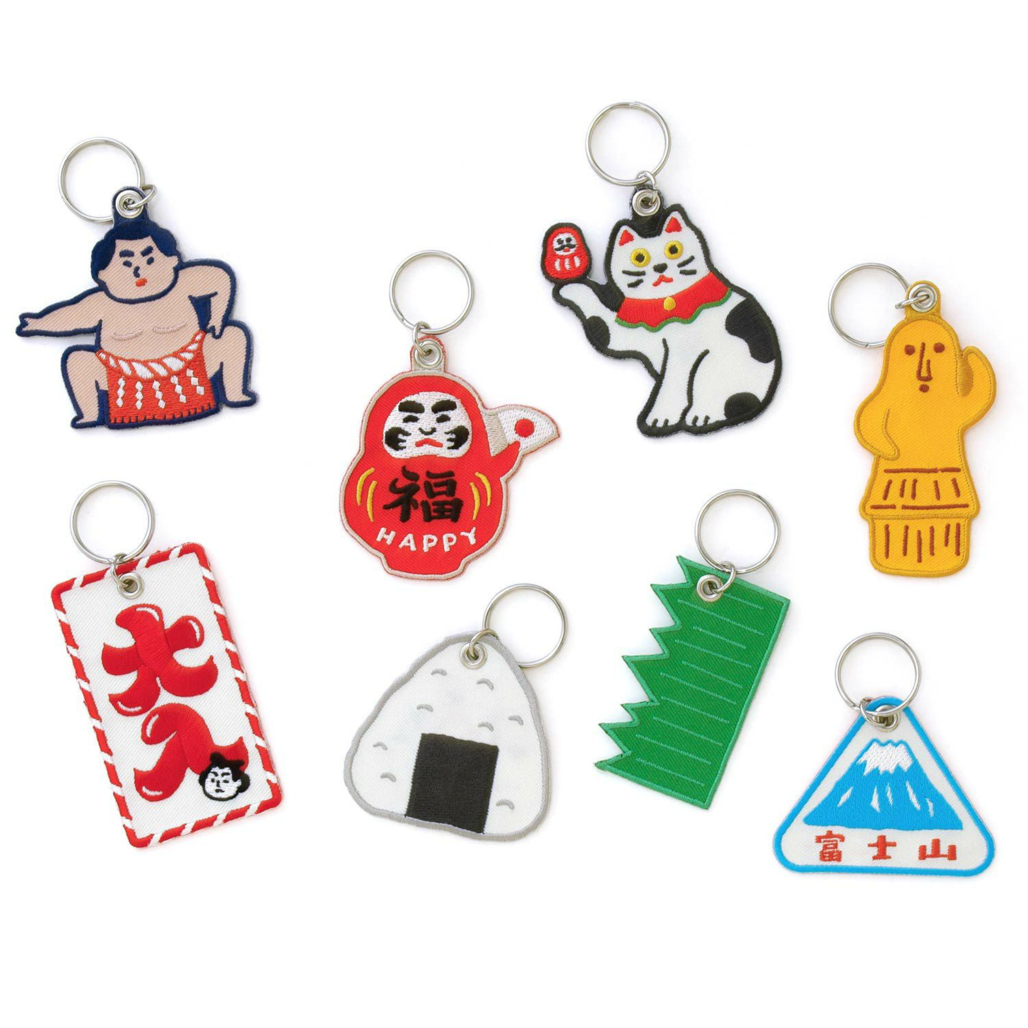 De Hightide Stitch Work Sleutelhanger Daruma van Hightide is een kleurrijke sleutelhanger met een charmante Daruma-popillustratie, perfect om een speels tintje aan je sleutels of tas te geven.