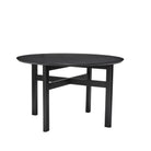 De Hubsch Fjord Eettafel Essenhout Zwart D120, van het merk Hubsch, is een ronde eettafel in zwart essenhout met vier poten en een stevige kruisbalkconstructie, afgebeeld tegen een witte achtergrond.