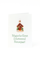 Op de Matriks Kerst- en Nieuwjaarskaart Magische Kerst Schitterend nieuwjaar! staat een unieke kerstbal geschilderd als een huis boven Nederlandse tekst op een witte achtergrond.