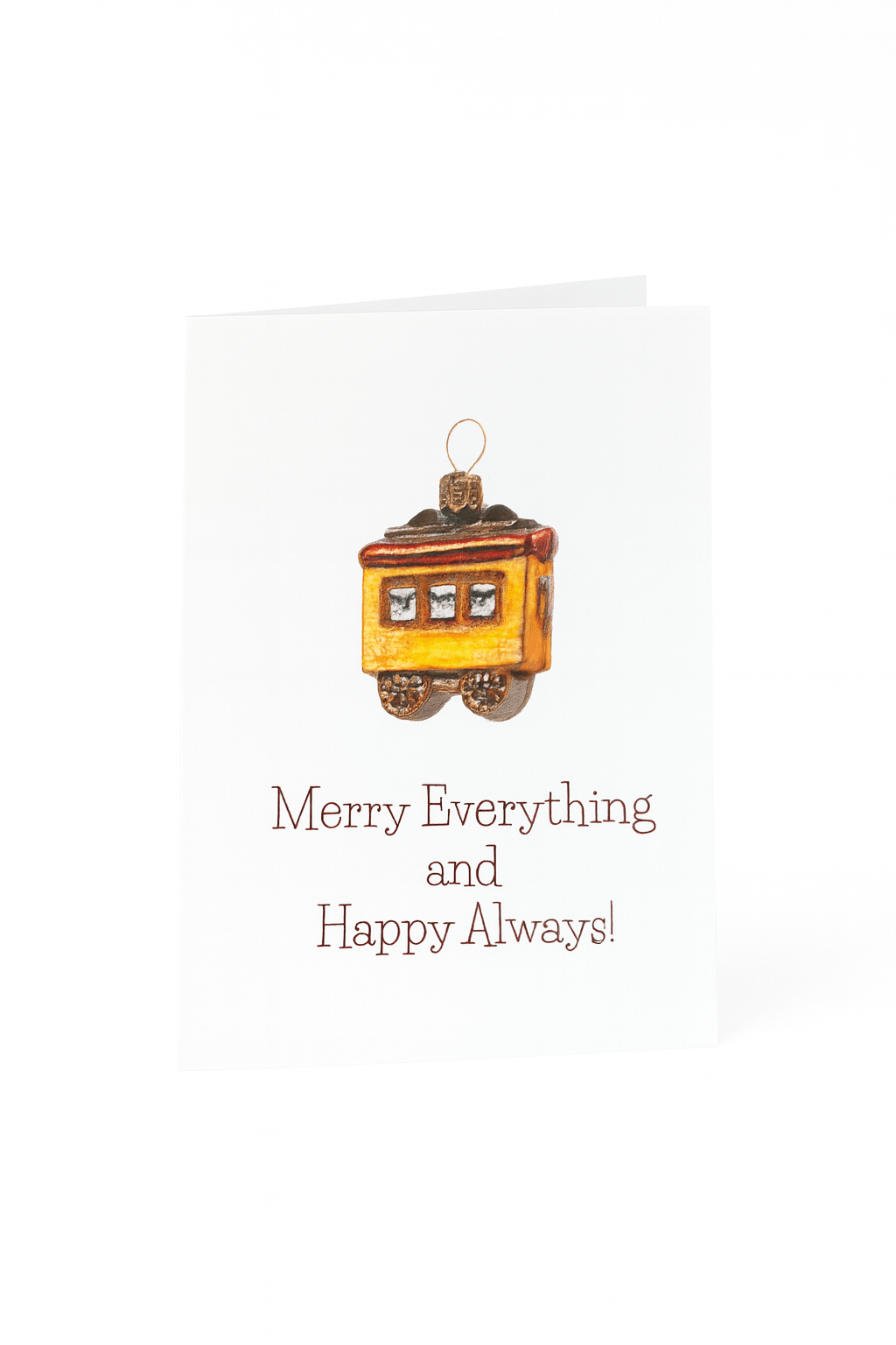 Stuur eindejaarsgroeten met de Matriks Kerst- en Nieuwjaarskaart Merry Everything and Happy Always! van Matriks - een unieke kaart met een geschilderd geel treinstel en vrolijke tekst op een witte achtergrond.