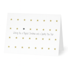 Een witte Matriks Kerst- en Nieuwjaarskaart van Matriks, versierd met gouden sterren en één zwarte ster. Op de voorkant staat: Wishing You a Magical Christmas and a Sparkly New Year.