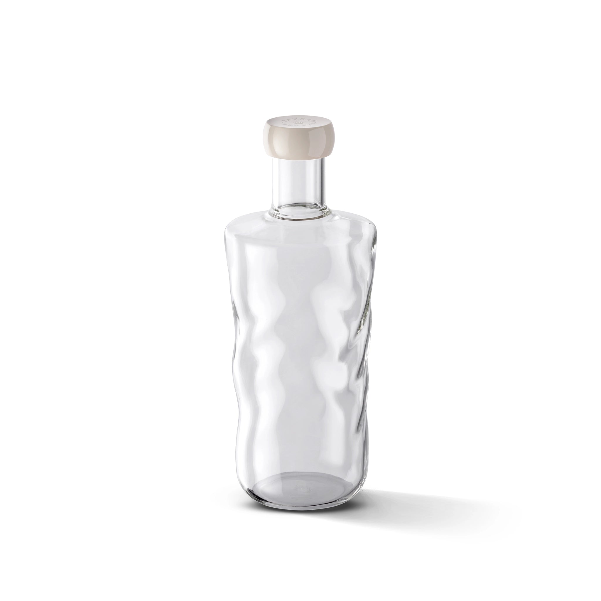 De Paveau Swirl Waterfles Wave Helder 1,25 l van Paveau is een stijlvolle en duurzame borosilicaatglazen fles met brede basis, smalle hals en ronde witte dop, perfect als cadeau.