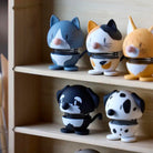 Voeg een speels accent toe aan je plank met zes verende dierenfiguurtjes - drie katten boven en drie honden onder, waaronder de Hoptimist Schnauzer Hond Wit/Zwart XS. Een kleurrijk decorstuk en het perfecte cadeau voor hondenliefhebbers.